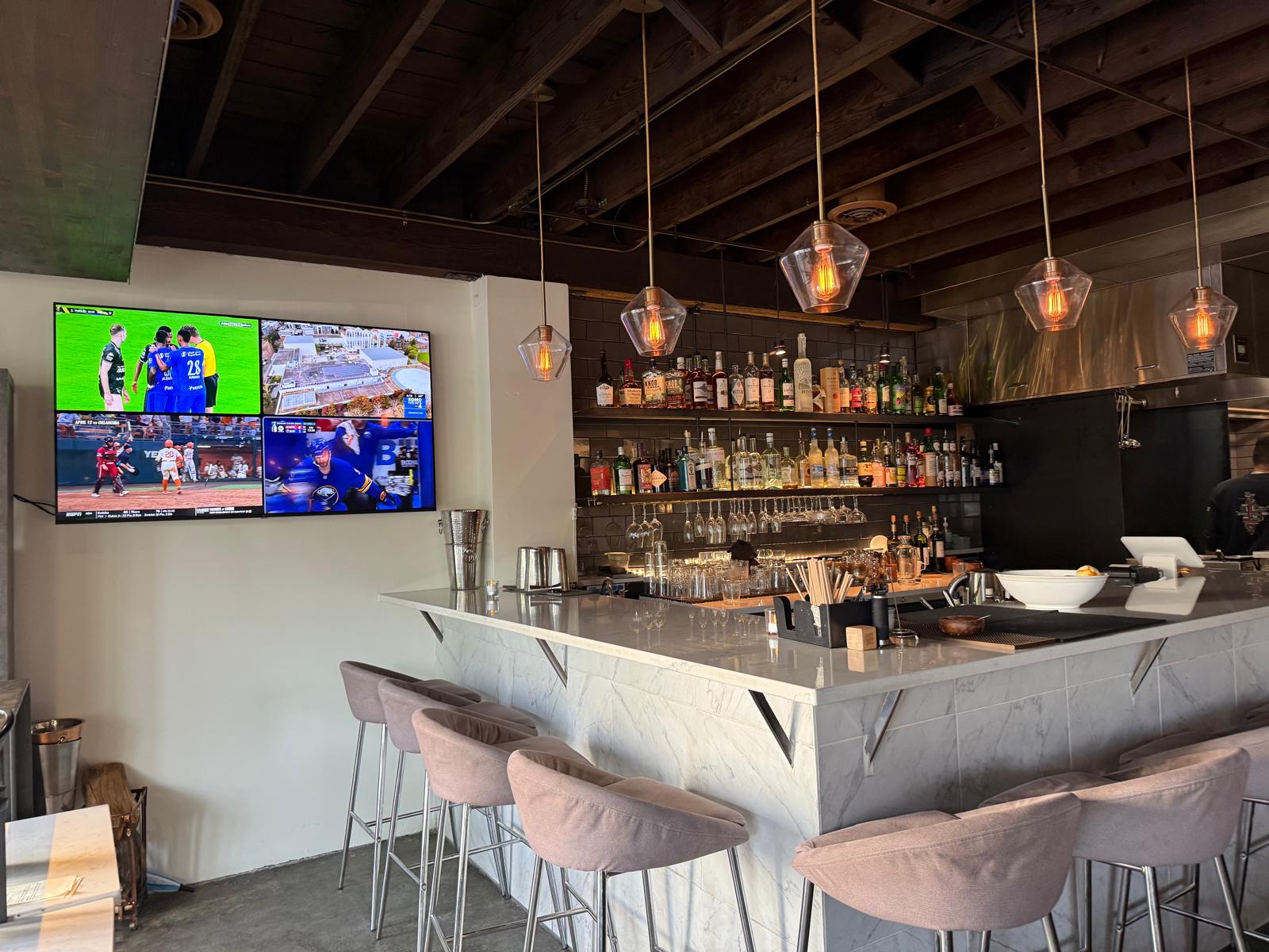 Bar with multiple TVs and full back-bar